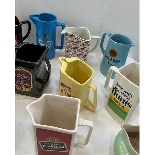 168 - Selection of pub advertising jugs