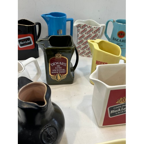 168 - Selection of pub advertising jugs