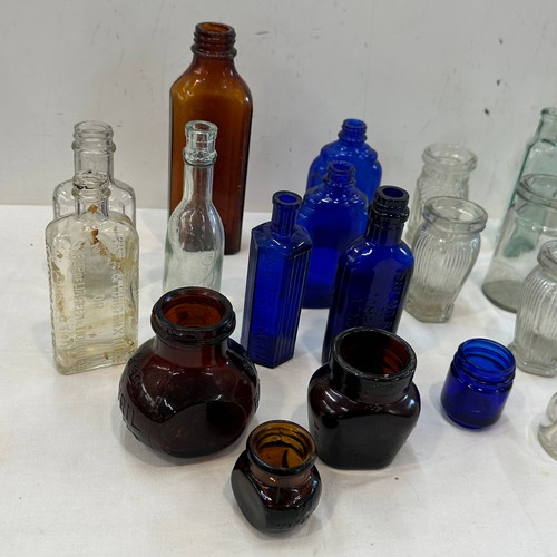 34 - Selection of vintage coloured glass bottles