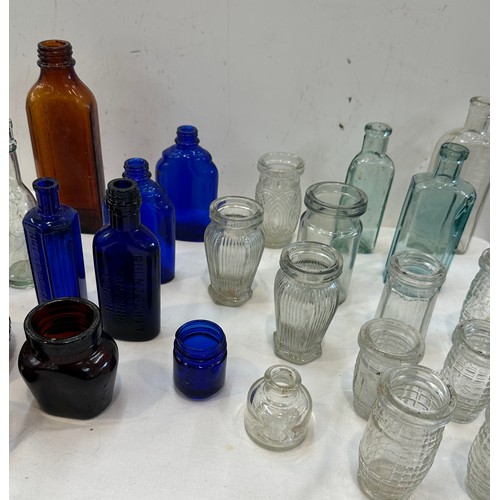 34 - Selection of vintage coloured glass bottles