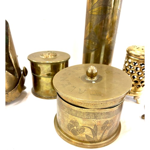 181 - Selection of trench art, pair brass candle holders