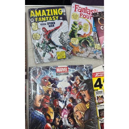 11 - Selection of Marvel merchandise to include fact files calendar, Spiderman and Fantastic Four tin wal... 