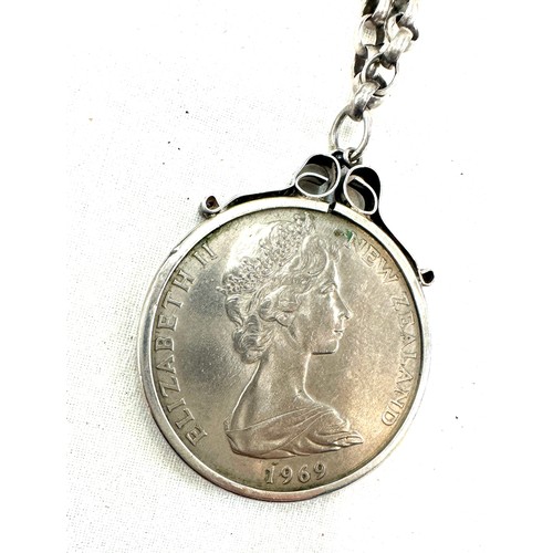 352 - Silver chain with a mounted one dollar coin and a silver coin with copper chain