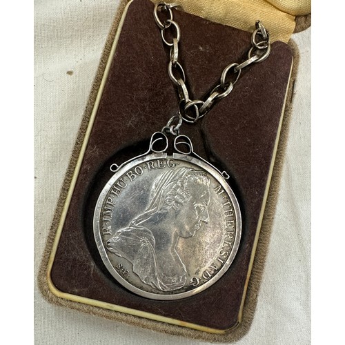 352 - Silver chain with a mounted one dollar coin and a silver coin with copper chain