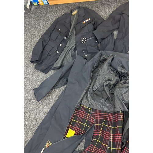 290 - Selection of mens vintage police officer clothing to include tunics and over coats