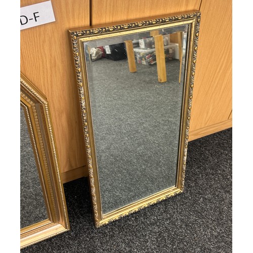 159 - Two wall hanging mirrors largest measures approximately 29 inches tall by 40 wide