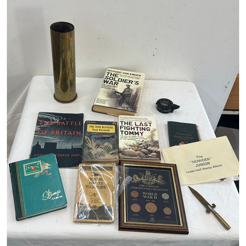 127 - Selection of vintage collectable items to include a brass shell, letter opener, war books, stamps, a... 