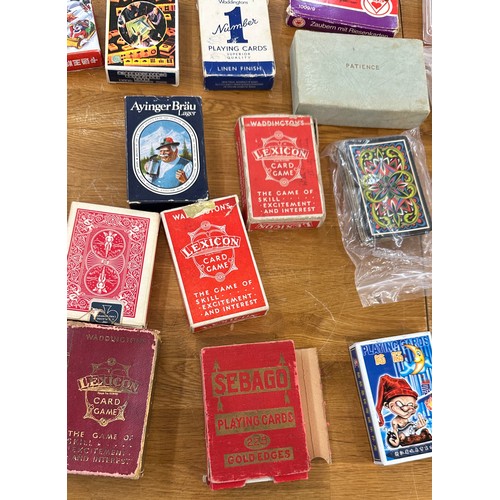 153 - Playing cards x 30 decks, sports, advertising, pin up girls, little mermaid, a vintage set of bridge... 