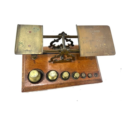 265 - Set brass post office scales, with some weights however not original, mounted brass barometer