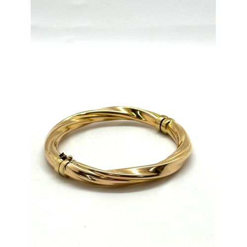 421 - Ladies 9ct gold bangle total weight 14grams