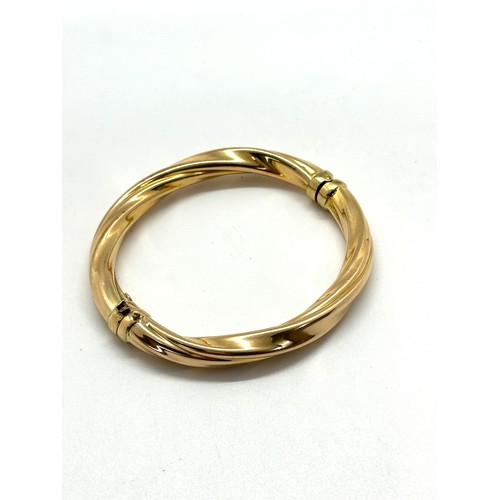 421 - Ladies 9ct gold bangle total weight 14grams