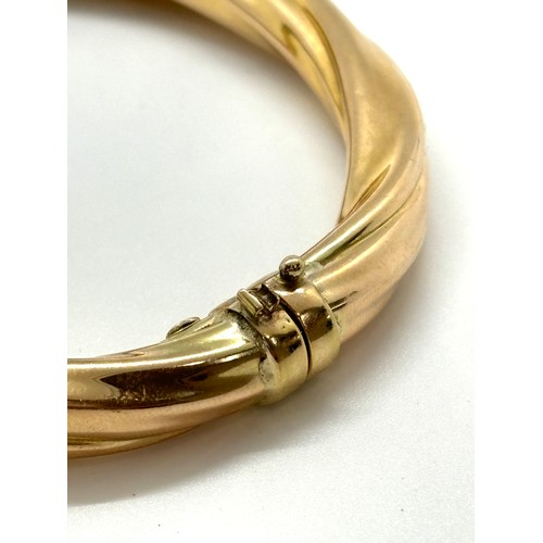 421 - Ladies 9ct gold bangle total weight 14grams