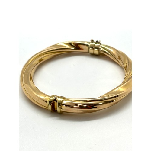 421 - Ladies 9ct gold bangle total weight 14grams