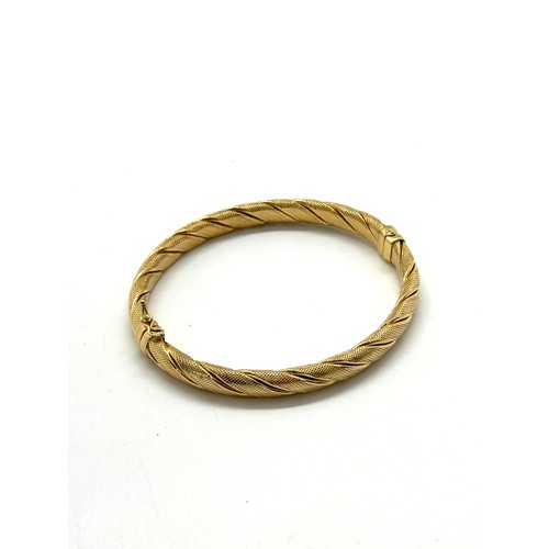 434 - Ladies 9ct gold bangle total weight 10 grams