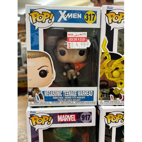 103 - 4 Boxed Funko pop figures includes X-Men, Spider-man, Marvel etc