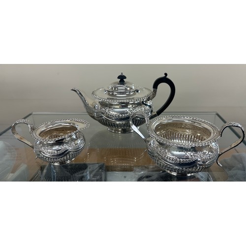 Silver three piece hallmarked tea set, makers marks JD WD, total weight 1300grams