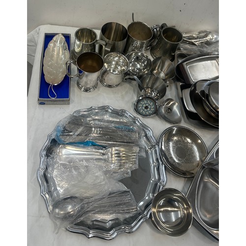 150 - Large selection of metalware includes stainless steel etc