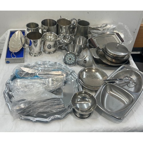 150 - Large selection of metalware includes stainless steel etc