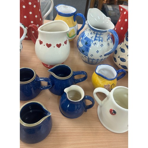 198 - Large selection of pottery jugs