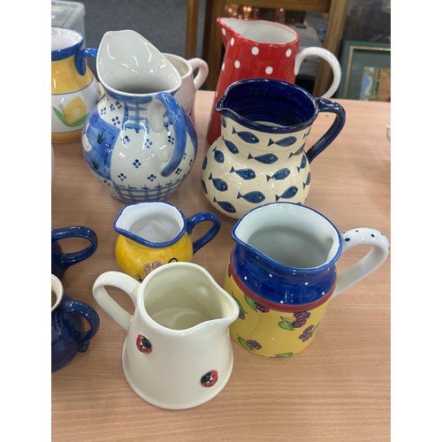 198 - Large selection of pottery jugs