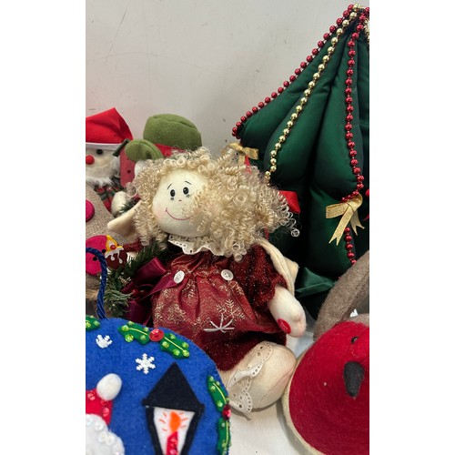 147 - Selection of christmas decorations includes christmas trees, door stops etc