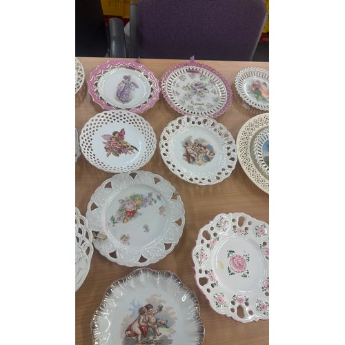 120 - Large selection of assorted ribbon plates