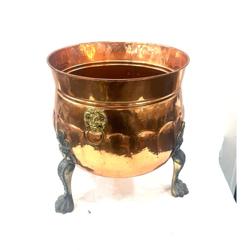 192 - Large brass and copper coal bucket with ball and claw feet, Height 14 inches, diameter 13 inches