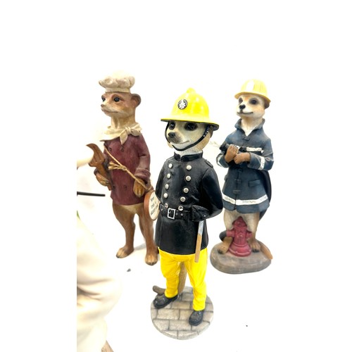 70 - Selection of novelty meerkats ornaments overall height approximately 11 inches