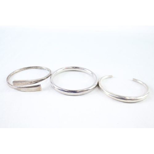 418 - Collection of Sterling Silver Bangles inc. Modernist, Torque, Bypass x 3 62g