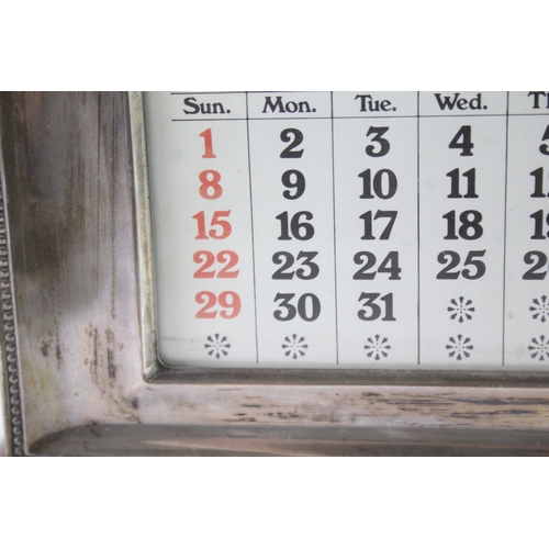 32 - .925 sterling silver front desk calendar