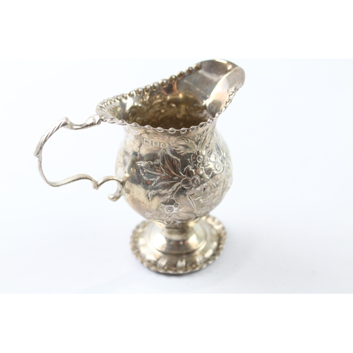 77 - .925 sterling silver victorian ornate cream jug