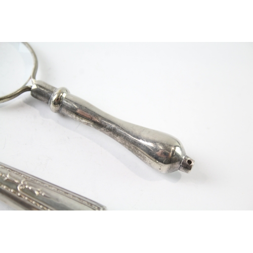 81 - 2 x .925 sterling silver handled magnifying glasses