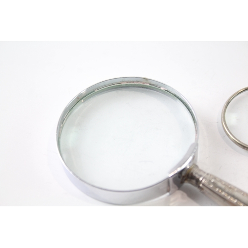 81 - 2 x .925 sterling silver handled magnifying glasses