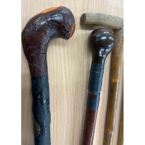 232 - Five assorted vintage walking sticks