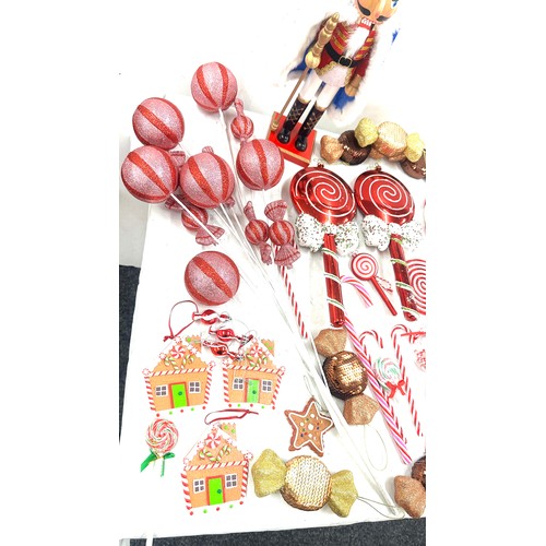 186 - Selection of Christmas decorations ' Candy Land' theme to include large sweet decorations, a nut cra... 