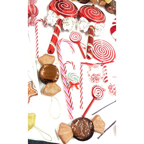 186 - Selection of Christmas decorations ' Candy Land' theme to include large sweet decorations, a nut cra... 