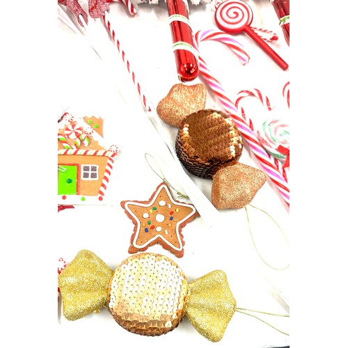 186 - Selection of Christmas decorations ' Candy Land' theme to include large sweet decorations, a nut cra... 