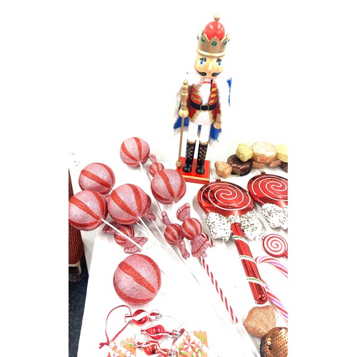 186 - Selection of Christmas decorations ' Candy Land' theme to include large sweet decorations, a nut cra... 