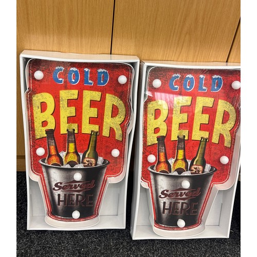 84 - Three new and sealed ' Cold Beer'  LED light up sign, approximate height of each 20 inches, Width 11... 