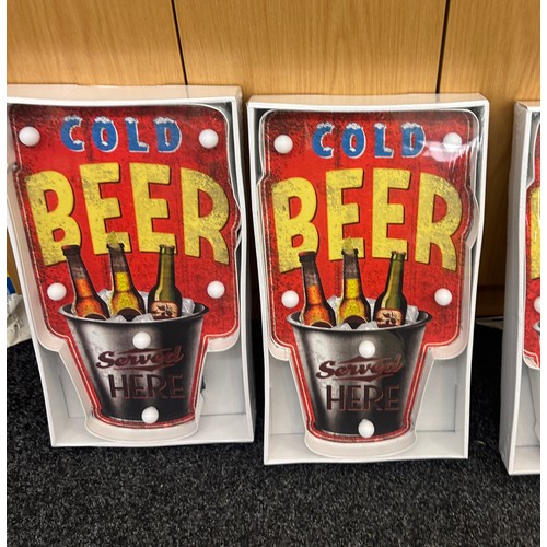 84 - Three new and sealed ' Cold Beer'  LED light up sign, approximate height of each 20 inches, Width 11... 