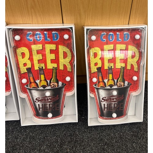 84 - Three new and sealed ' Cold Beer'  LED light up sign, approximate height of each 20 inches, Width 11... 