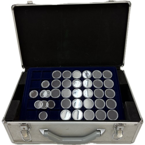 69 - Lockable coin collectors case, with blue coin inserts, quantity of coin plastic capsules (with keys)