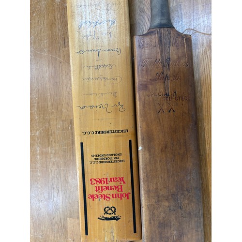 249 - 2 Vintage wooden cricket bats, one signed