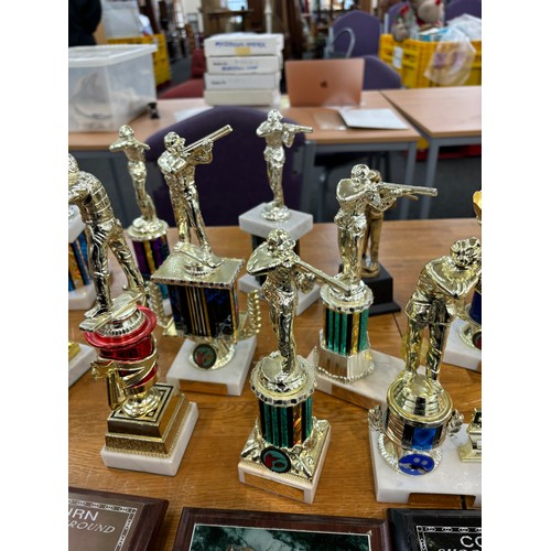 130 - Large selection of gun shooting trophies