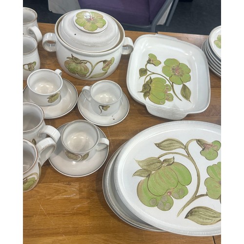 142 - Large part Denby ware dinner service to include plates, cups, lidded tureen etc