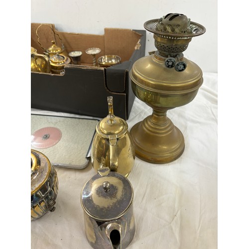 132 - Large selection of assorted brass ware includes oil lamp etc