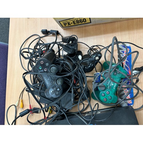 218 - Selection of 3 Play station 2 consoles, a selection of PS2 games and a large selection of controller... 