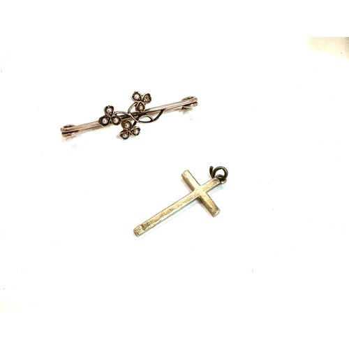 473 - 9ct gold stone set bar brooch and a 9ct cross pendant approx weight 3.8 grams