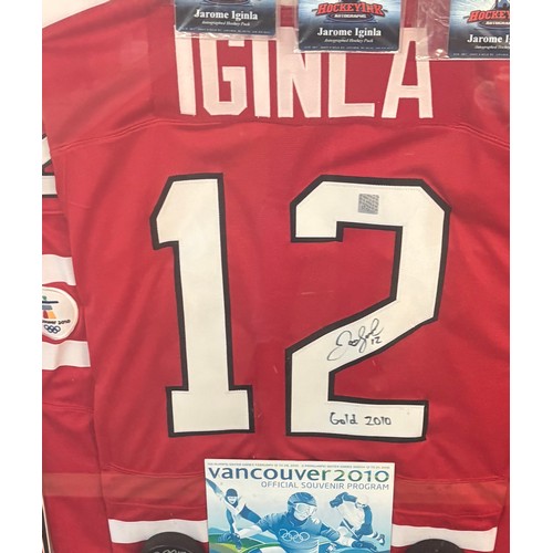 156 - Framed signed Jarome Iginla Vancouver 2010 autographed official jersey, programme and pucks achievin... 