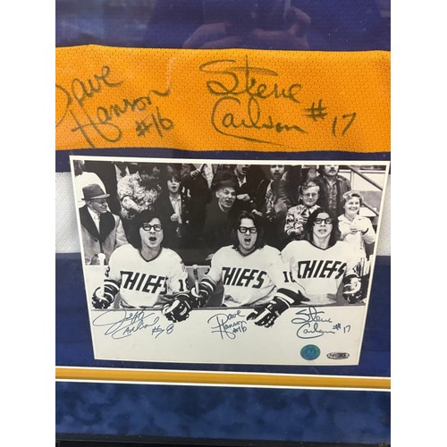 232 - Framed signed Charlestown Chiefs autographed official jersey, photo and puck all within a wall hangi... 